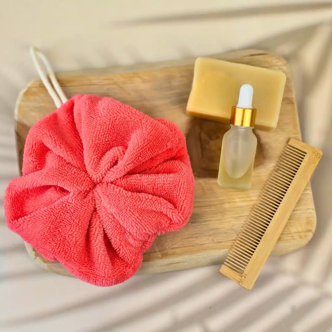 Fleur de douche lavable corail