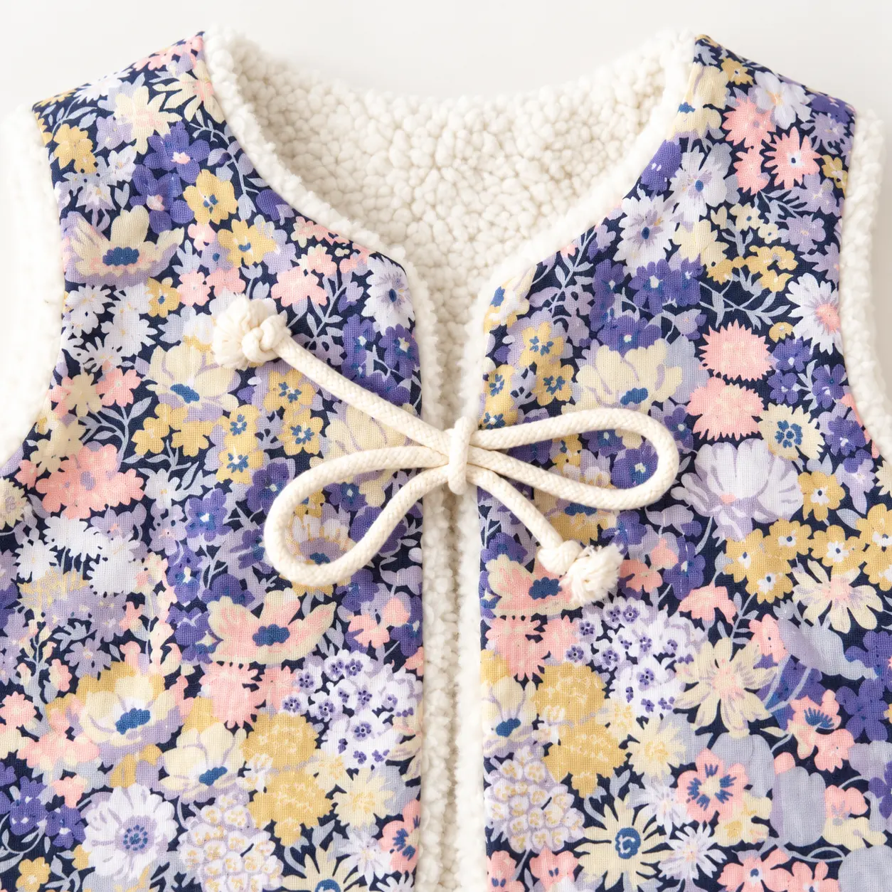Gilet sans manche bébé réversible - détails