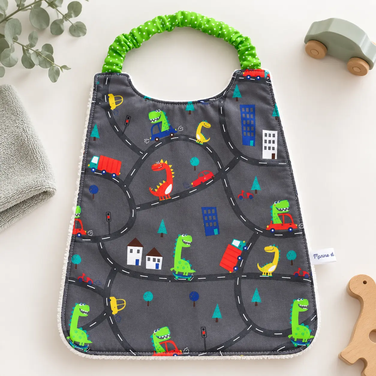 Bavoir élastique maternelle dinosaure